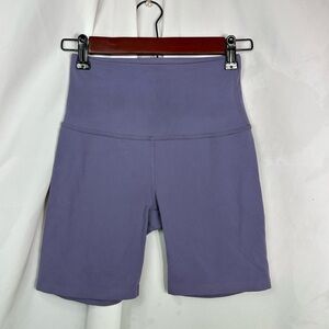 Beyond Yoga lavender high waisted biker shorts size S
